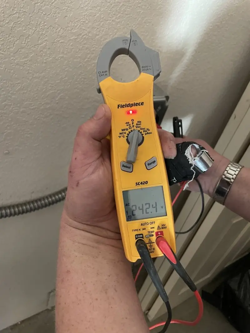 Voltage testing with clamp meter during Circuit Breaker Repair in Oberlin